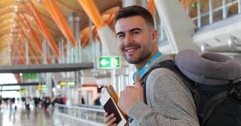 Smiling man at airport