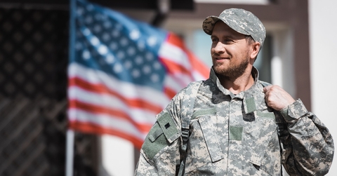 Smiling military veteran in camouflage