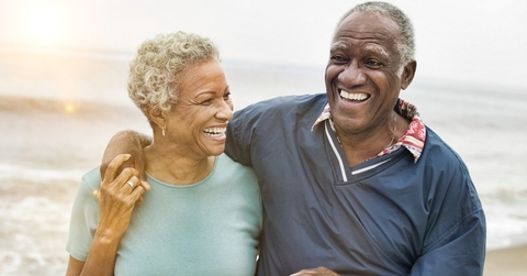 happy senior african american couple on the beach
