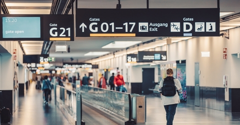Travelers going to airport gate