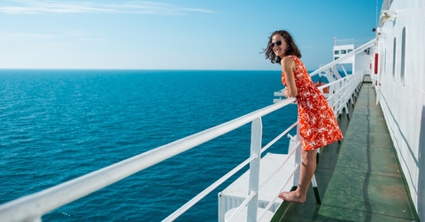 woman is sailing on a cruise ship