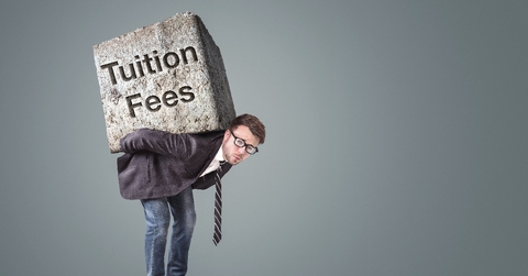 man carrying a heavy stone marked with tuition fees