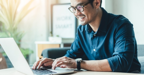 man searching for information using the internet