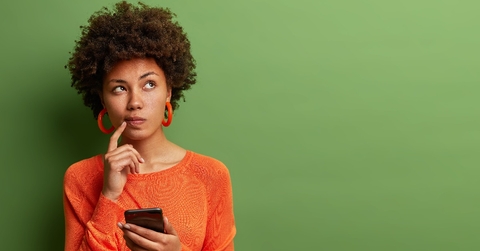 ethnic woman ponders on how to answer question