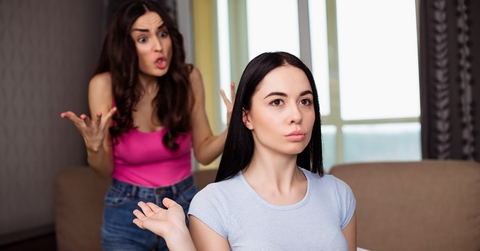 girl friends in casual wear quarreled and shouted at each other