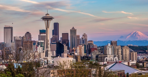 skyline of downtown seattle, with mount rainier in the background