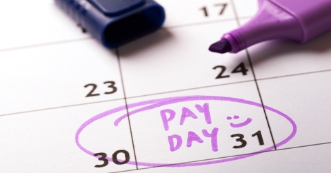 calendar having payday written on date with purple marker