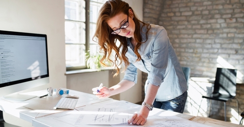 young female architect working on project