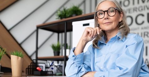 senior businesswoman looks seriously at the camera