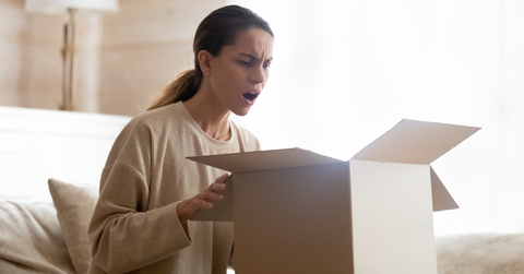 annoyed woman receiving defective product 