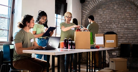 volunteers working in community donation center 