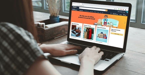woman using laptop to shop from amazon