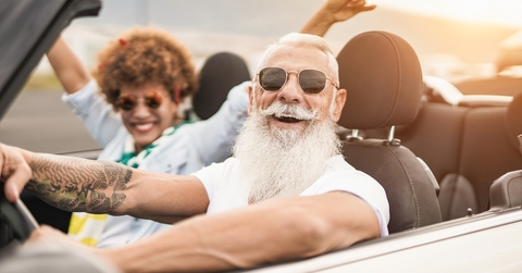 senior multiracial couple having fun on road trip