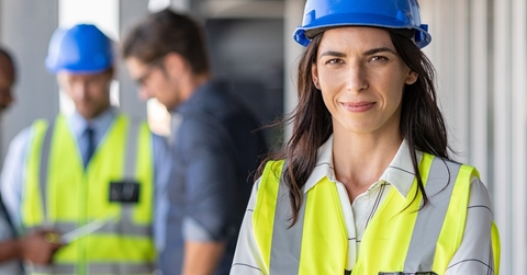 female architect standing confidently