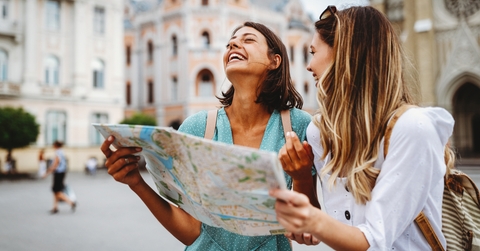 girls looking for direction in the city
