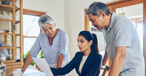 mature couple getting advice from their financial consultant