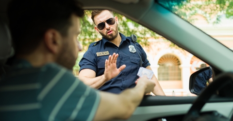driver giving bribe money