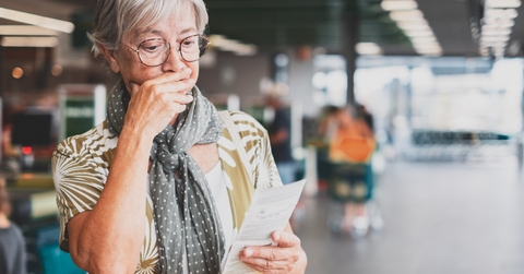 Woman surprised at grocery bill