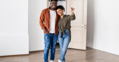 couple showing key