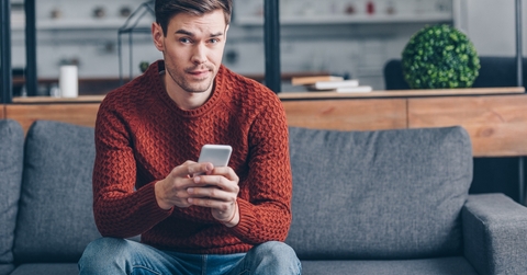 man holding smartphone