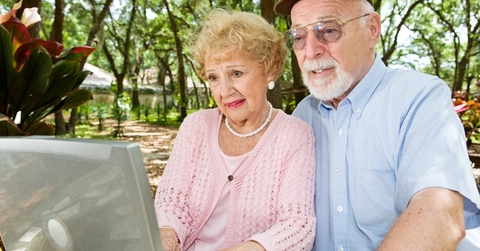 senior couple on laptop
