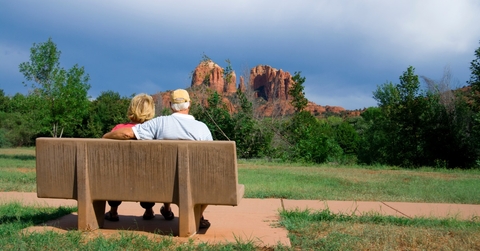 senior couple on bench in arizona