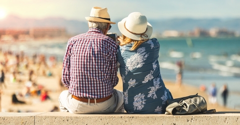 senior couple enjoying time on beach