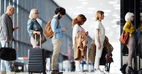 multi ethnic people waiting at airport