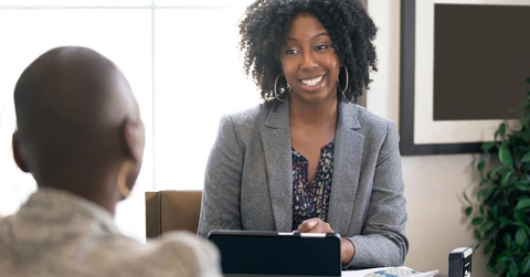 business woman talking to male candidate