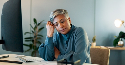 business woman experiencing burnout at work
