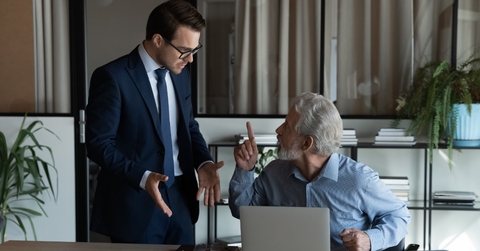 male colleague arguing with senior boss