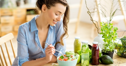 woman eating healthy salad