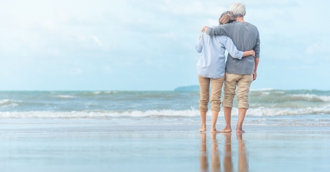 senior couple enjoying at tropical resort