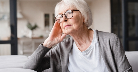 grandmother sitting on the sofa couch