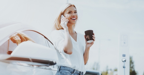 attractive girl at car charging station