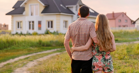 couple looking at their new house