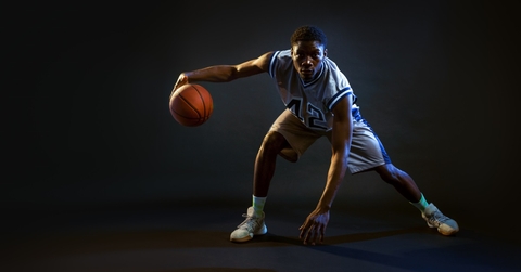 basketball player showing tricks with ball