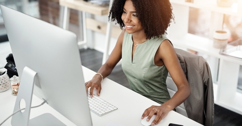 happy woman on a computer