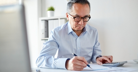 businessman with calculator