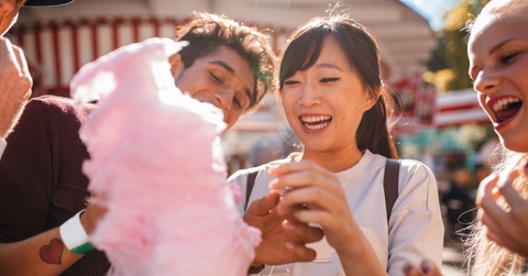people sharing cotton candy