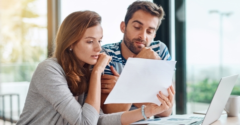 couple with finance documents