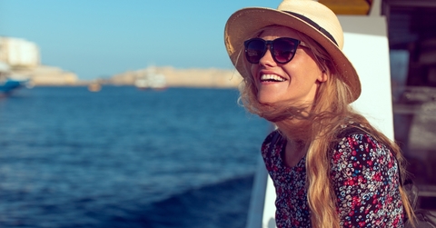 happy woman cruising ship
