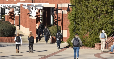 College students walk around campus