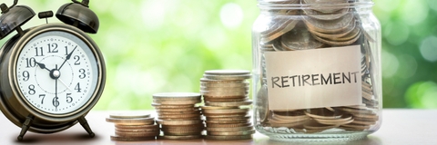 putting coins in glass jar