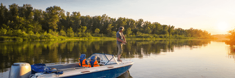  man on a motor boat fishing