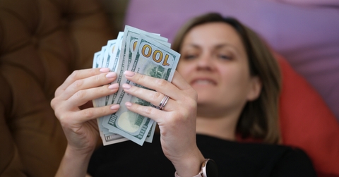 woman counting money