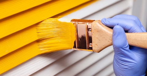 hand painting wooden door yellow