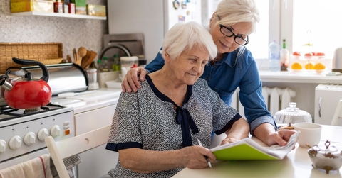 elderly mother with paperwork