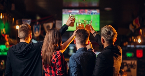Friends watches football on TV