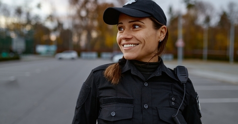 portrait of smiling police woman